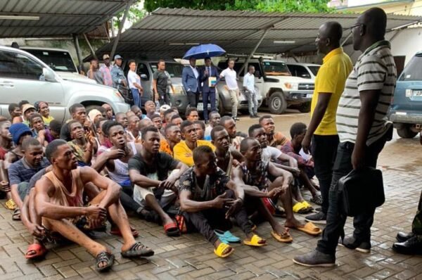 Police arrest protesters on a sit-down strike