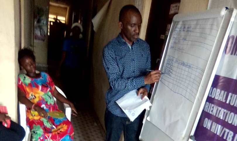 Mr Bangura School peer Navigators on preparing monthly report