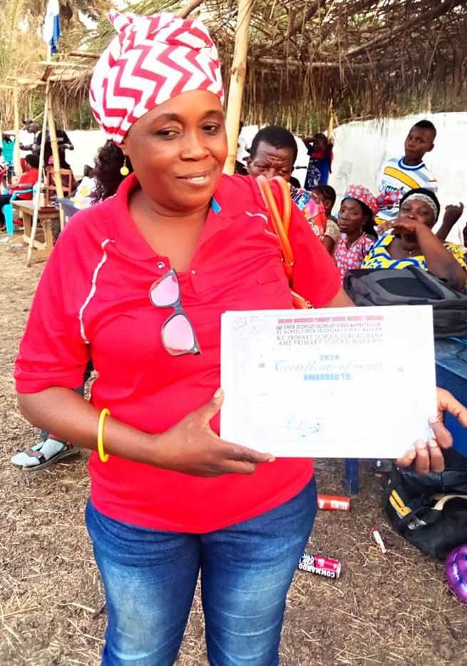 Councilor Deborah holding the Certificate