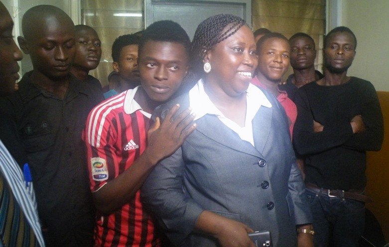 Calaba Town Youths celebrate their release from Pademba Prison with the Executive Director